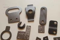 精密沖壓件產生時出現翻料、扭曲的原因及解決方法